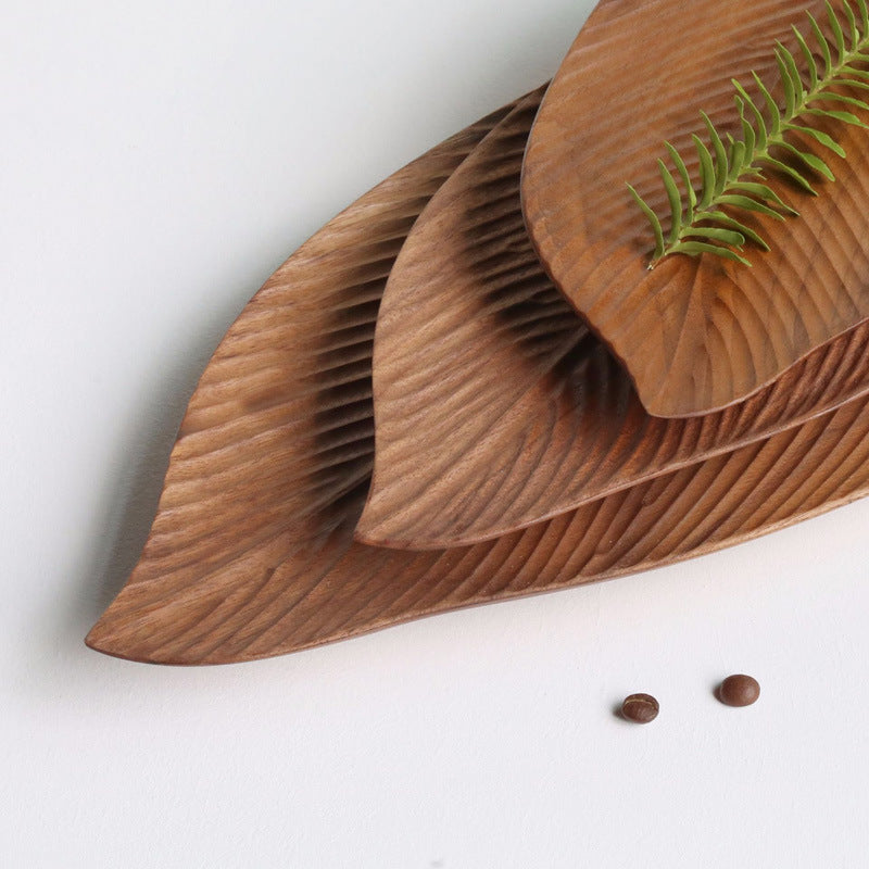 Wooden saucer fruit tray by WoodyKitchenware, natural wood finish, perfect for fruit display and elegant dining presentation.