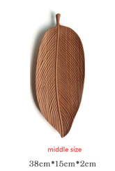 Wooden saucer fruit tray by WoodyKitchenware featuring natural wood grain, ideal for serving fruits with elegant, rustic style.
