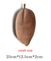 Wooden saucer fruit tray by WoodyKitchenware featuring natural wood grain and smooth finish for elegant dining presentation.