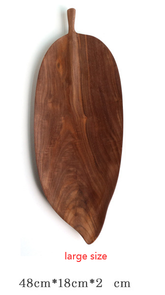 Wooden saucer fruit tray from WoodyKitchenware, showcasing natural wood grain and elegant design for serving fruit.