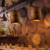 Rustic wooden wine barrel chandelier with vintage design, featured in a dining or living space, by WoodyKitchenware.