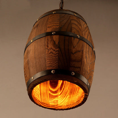 Rustic wooden wine barrel chandelier with vintage design, hanging in a cozy dining or living space, featuring exposed bulbs.