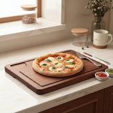 Rustic wooden steak and pizza board with sauce trough from WoodyKitchenware, perfect for serving grilled meats and pizzas.