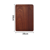 Rustic wooden steak and pizza board from WoodyKitchenware with sauce trough, perfect for versatile dining and food presentation.