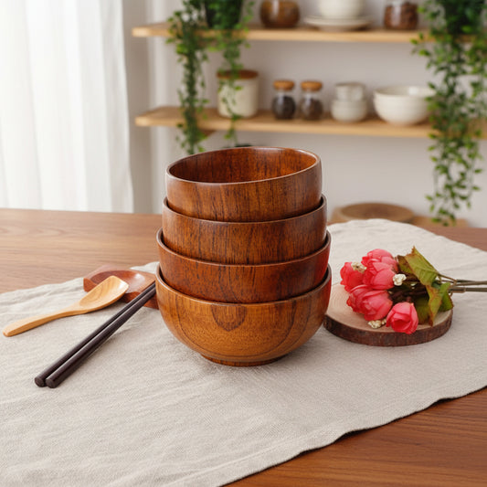 Set of four wooden round bowls by WoodyKitchenware, showcasing natural wood grain, perfect for serving or table decoration.