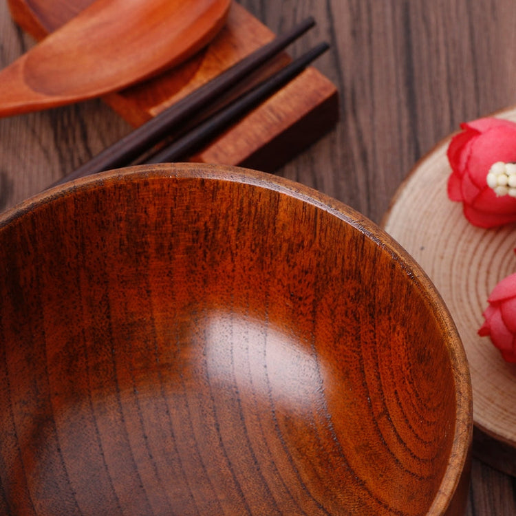 Set of four round wooden bowls by WoodyKitchenware, showcasing natural wood grain and smooth finish for tableware.