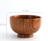 Set of four round wooden bowls by WoodyKitchenware, natural wood finish, perfect for serving or decorative use.