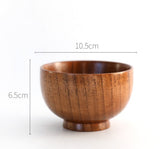 Set of four round wooden bowls by WoodyKitchenware, showcasing natural wood grain and smooth finish for rustic table decor.