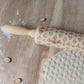 Wooden Christmas poker printing rolling pin with festive holiday designs, perfect for adding seasonal fun to baking.