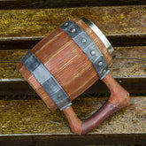 Sculpted wooden barrel stein by WoodyKitchenware featuring a detailed artisan design, perfect for enjoying drinks in rustic style.