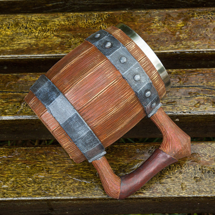 Sculpted wooden barrel stein by WoodyKitchenware featuring a detailed artisan design, perfect for enjoying drinks in rustic style.