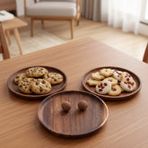 Round wooden plate from WoodyKitchenware, natural wood finish, perfect for elevating your dining experience.