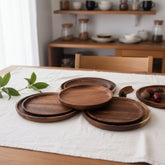 Round wooden plate from WoodyKitchenware by WoodyKitchenware, showcasing natural wood grain and smooth finish for elegant dining.