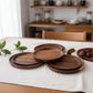 Round wooden plate from WoodyKitchenware by WoodyKitchenware, showcasing natural wood grain and smooth finish for elegant dining.