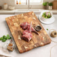 Yellow acacia wood cutting board by WoodyKitchenware, solid kitchen essential for meal prep and food chopping.