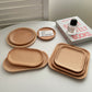 Round wooden trays from WoodyKitchenware INS Wind Wooden Pallets collection, showcasing minimalist design and natural wood finish.