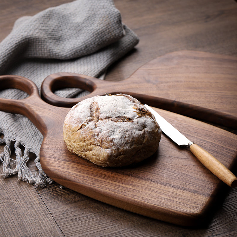 Black Walnut cutting board by WoodyKitchenware, elegant and durable, with a smooth surface ideal for knife-friendly food prep.
