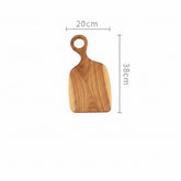 Black walnut cutting board by WoodyKitchenware, elegant and durable wood surface ideal for chopping and food prep.