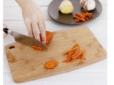 Square bamboo cutting board from WoodyKitchenware, showcasing a smooth, natural bamboo surface for food prep and chopping.