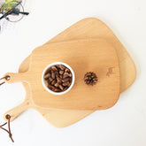 Mini solid wood breadboard by WoodyKitchenware, compact and versatile for serving or food prep, with a charming natural finish.