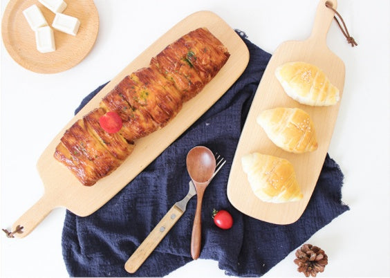 Wooden mini breadboard from WoodyKitchenware, compact and versatile solid wood breadboard for kitchen use.