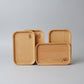 Wooden dish tray in long fish shape by WoodyKitchenware, handcrafted with coastal charm for serving or decorative use.