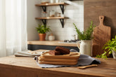 Handcrafted wooden fish-shaped dish tray by WoodyKitchenware, perfect for coastal-themed table settings and serving small dishes.