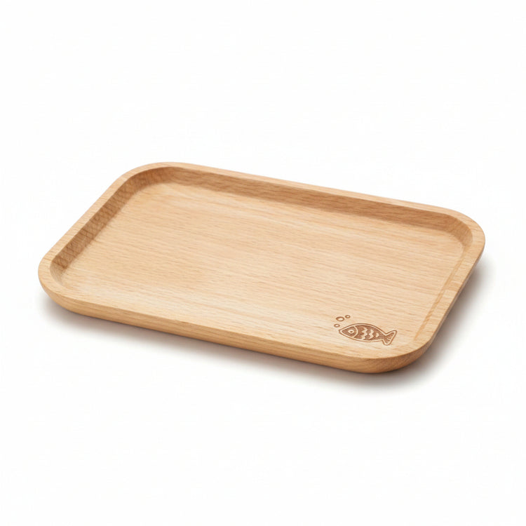 Handcrafted wooden dish tray shaped like a long fish with mushroom accents, perfect for coastal-style table decor by WoodyKitchenware.