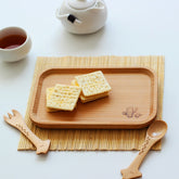 Handcrafted wooden fish-shaped dish tray by WoodyKitchenware, perfect for coastal-inspired table decor and serving.