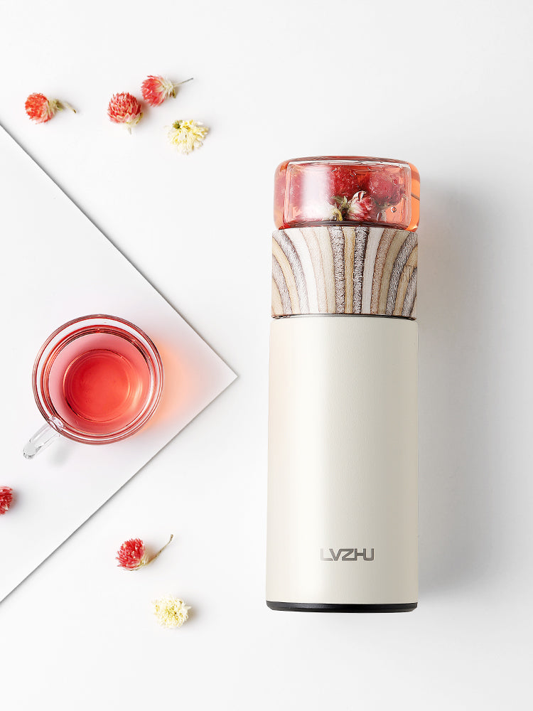 Pink WoodyKitchenware stainless steel thermos water bottle with tea infuser, 360ml travel mug for hot and cold beverages.