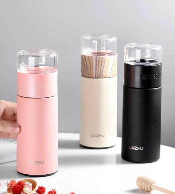 Pink WoodyKitchenware stainless steel 360ml thermos water bottle with tea infuser, ideal for travel and tea separation.