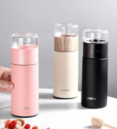 Pink WoodyKitchenware stainless steel 360ml thermos water bottle with tea infuser, ideal for travel and tea separation.