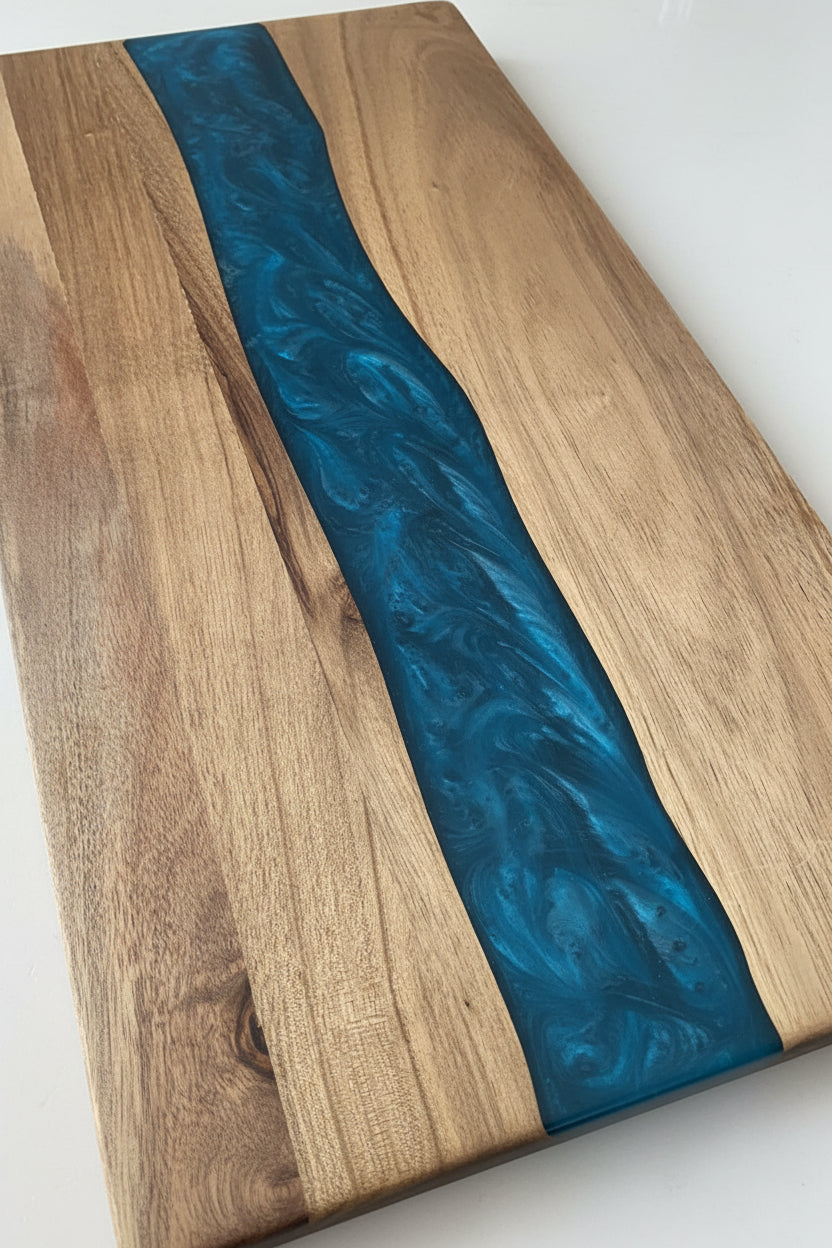 Square resin-acacia board by WoodyKitchenware with epoxy timber fusion, showcasing a handcrafted wooden serving or cutting board.