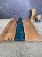 Square resin-acacia board by WoodyKitchenware featuring epoxy timber fusion, crafted by WoodyKitchenware.
