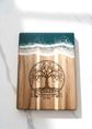 Personalized acacia mangium wooden board by WoodyKitchenware, perfect for wedding or housewarming gifts, with engraved design.