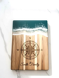 Personalized Acacia Mangium wooden board by WoodyKitchenware, ideal for wedding or housewarming gift, showing engraved custom design.